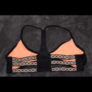 Black and and reversible bikini top.